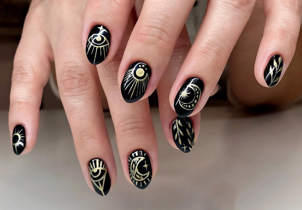 Gold Sun and Moon Nail Art