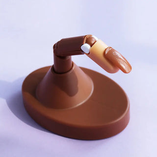 Brown Mechanical False Finger - With Base by OTHER sold by DTK Nail Supply