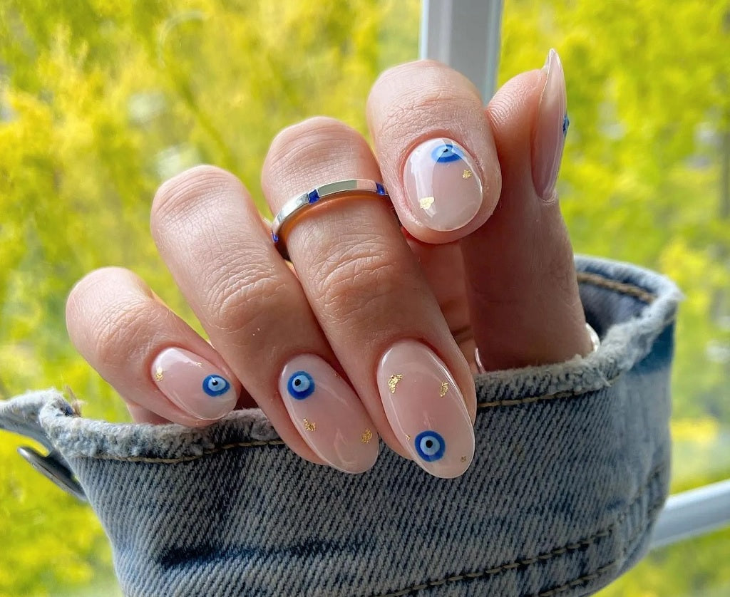 6. Pink and Green Evil Eye Nail Design - wide 11