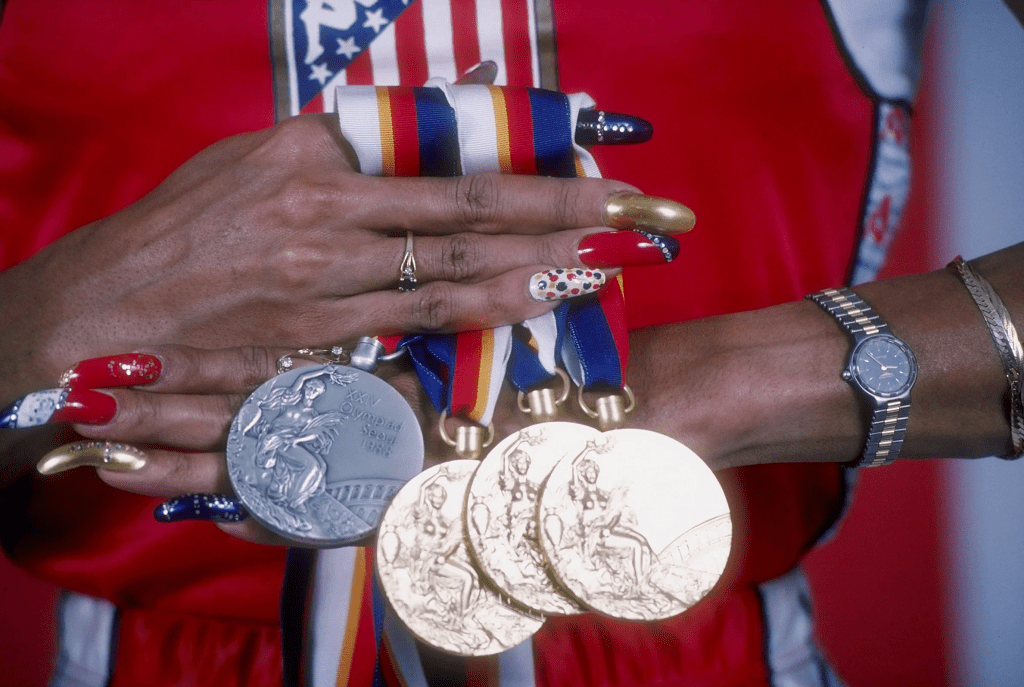 Be a Champion Inspired by Speed, Style, and Success with Flo Jo Nails - DTK Nail Supply