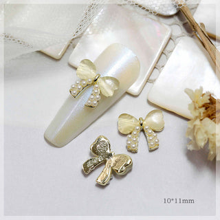  LX2 #357 2PCS Heart Bow Pearl Nail Charm by Nail Charm sold by DTK Nail Supply