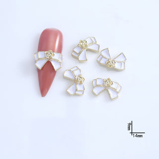 #287 LX2 #287-288 2PCS Gold Bow Nail Charm by Nail Charm sold by DTK Nail Supply